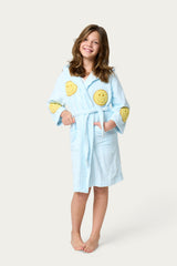 Light blue bathrobe with yellow smiley face patches. Kids bathrobe 